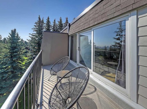 302-332 Cedar Crescent Sw, Calgary, AB - Outdoor With Balcony With Exterior