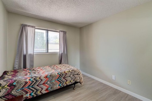 106-659 4 Avenue Ne, Calgary, AB - Indoor Photo Showing Bedroom