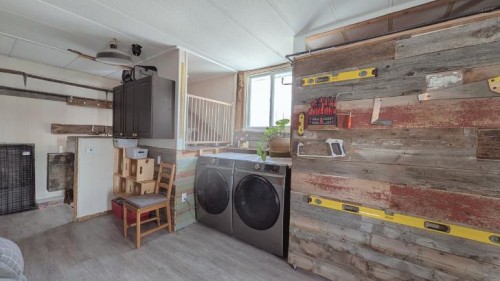 311 47 Avenue West, Claresholm, AB - Indoor Photo Showing Laundry Room