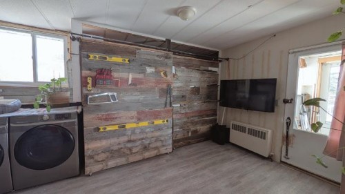 311 47 Avenue West, Claresholm, AB - Indoor Photo Showing Laundry Room