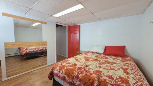 311 47 Avenue West, Claresholm, AB - Indoor Photo Showing Bedroom