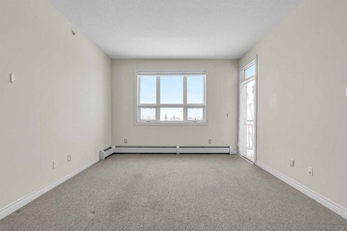 415-26 Val Gardena View Sw, Calgary, AB - Indoor Photo Showing Other Room