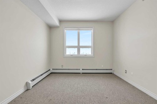 415-26 Val Gardena View Sw, Calgary, AB - Indoor Photo Showing Other Room