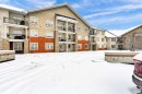 415-26 Val Gardena View Sw, Calgary, AB  - Outdoor With Balcony With Facade 