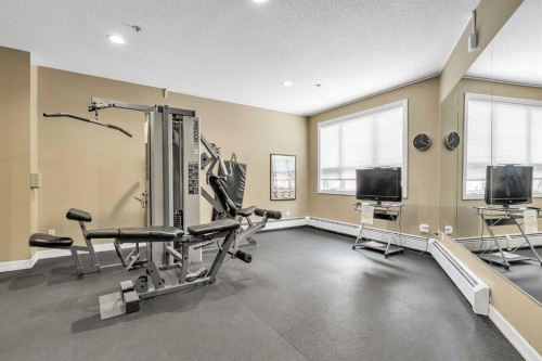 415-26 Val Gardena View Sw, Calgary, AB - Indoor Photo Showing Gym Room