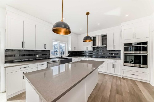 267 Chelsea Heath, Chestermere, AB - Indoor Photo Showing Kitchen With Double Sink With Upgraded Kitchen