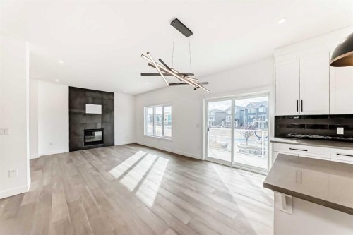 267 Chelsea Heath, Chestermere, AB - Indoor With Fireplace