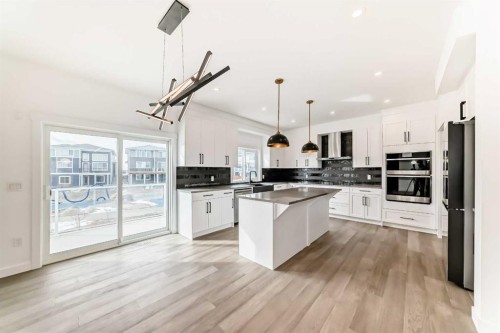 267 Chelsea Heath, Chestermere, AB - Indoor Photo Showing Kitchen With Upgraded Kitchen