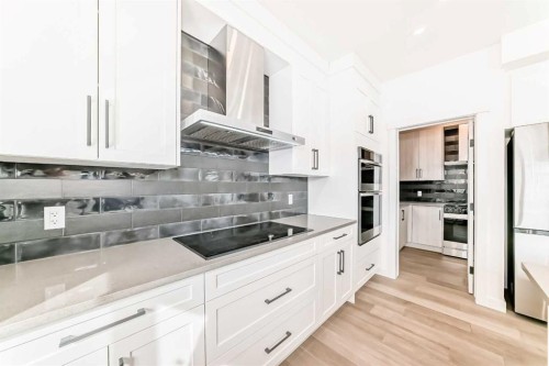 267 Chelsea Heath, Chestermere, AB - Indoor Photo Showing Kitchen With Upgraded Kitchen