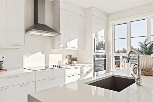 604 Sovereign Common Sw, Calgary, AB - Indoor Photo Showing Kitchen With Upgraded Kitchen