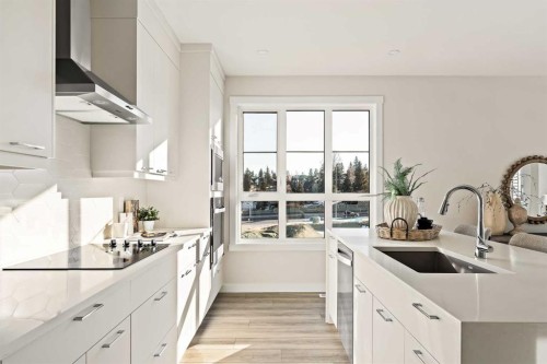 604 Sovereign Common Sw, Calgary, AB - Indoor Photo Showing Kitchen With Upgraded Kitchen