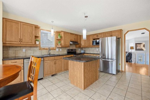 1331 Sunvista Way Se, Calgary, AB - Indoor Photo Showing Kitchen With Stainless Steel Kitchen