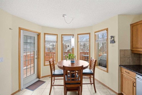 1331 Sunvista Way Se, Calgary, AB - Indoor Photo Showing Dining Room