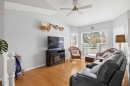1331 Sunvista Way Se, Calgary, AB  - Indoor Photo Showing Living Room 