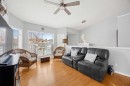 1331 Sunvista Way Se, Calgary, AB  - Indoor Photo Showing Living Room 
