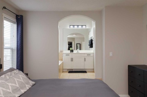 86 Cougarstone Court Sw, Calgary, AB - Indoor Photo Showing Bedroom