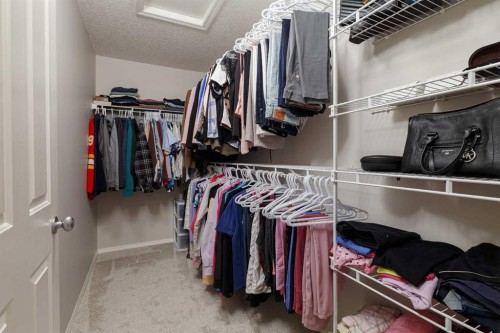 86 Cougarstone Court Sw, Calgary, AB - Indoor With Storage