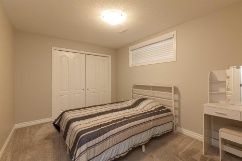 86 Cougarstone Court Sw, Calgary, AB - Indoor Photo Showing Bedroom
