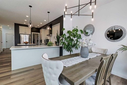 3 Saddlebred Court, Cochrane, AB - Indoor Photo Showing Dining Room