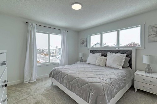 3 Saddlebred Court, Cochrane, AB - Indoor Photo Showing Bedroom