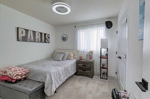 3 Saddlebred Court, Cochrane, AB - Indoor Photo Showing Bedroom