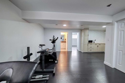3 Saddlebred Court, Cochrane, AB - Indoor Photo Showing Gym Room