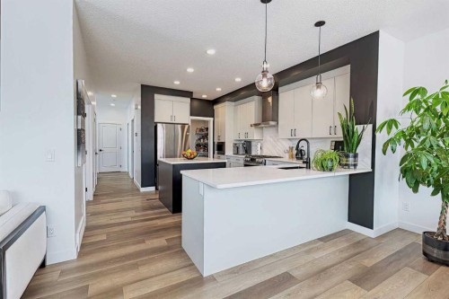 3 Saddlebred Court, Cochrane, AB - Indoor Photo Showing Kitchen With Upgraded Kitchen