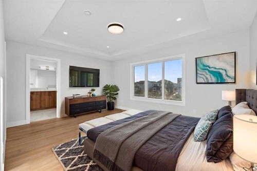 26 North Bridges Way, Langdon, AB - Indoor Photo Showing Bedroom