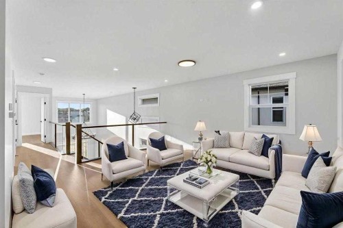 26 North Bridges Way, Langdon, AB - Indoor Photo Showing Living Room