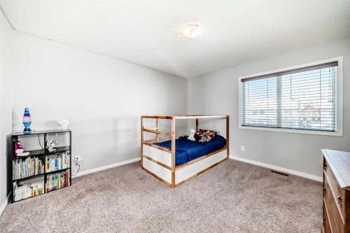 6 Elgin Meadows Gardens Se, Calgary, AB - Indoor Photo Showing Bedroom