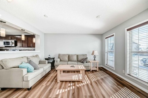 6 Elgin Meadows Gardens Se, Calgary, AB - Indoor Photo Showing Living Room