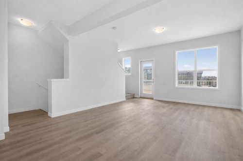 403-137 Red Embers Link Ne, Calgary, AB - Indoor Photo Showing Other Room