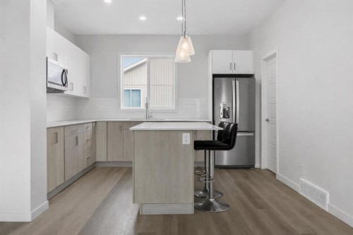 403-137 Red Embers Link Ne, Calgary, AB - Indoor Photo Showing Kitchen