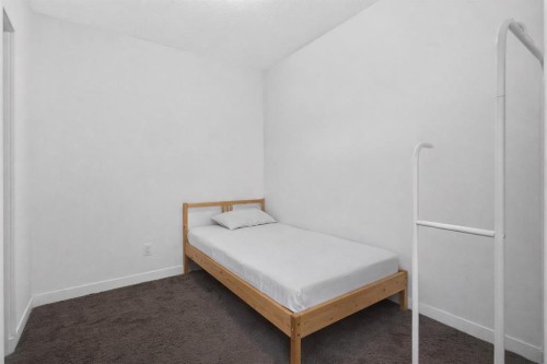 403-137 Red Embers Link Ne, Calgary, AB - Indoor Photo Showing Bedroom