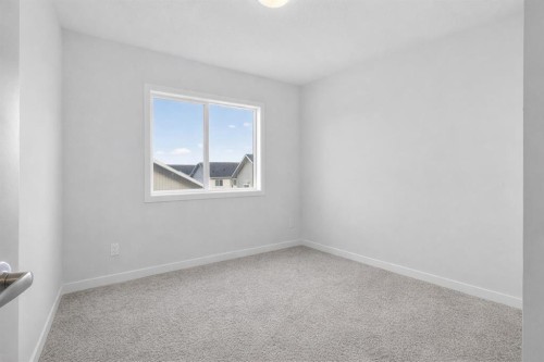 403-137 Red Embers Link Ne, Calgary, AB - Indoor Photo Showing Other Room