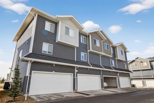 403-137 Red Embers Link Ne, Calgary, AB - Outdoor