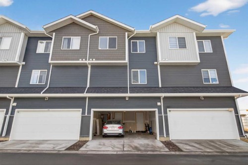 403-137 Red Embers Link Ne, Calgary, AB - Outdoor With Facade