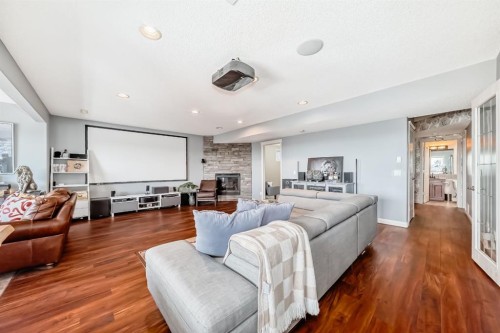 268 Springbluff Bay Sw, Calgary, AB - Indoor Photo Showing Living Room With Fireplace