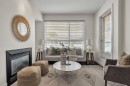 409-1000 Centre Avenue Ne, Calgary, AB  - Indoor Photo Showing Living Room With Fireplace 