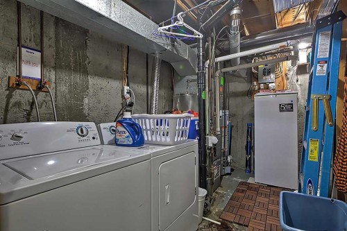 80 Queen Alexandra Close Se, Calgary, AB - Indoor Photo Showing Laundry Room