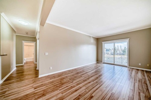 205-7 Lineham Avenue, Okotoks, AB - Indoor Photo Showing Other Room
