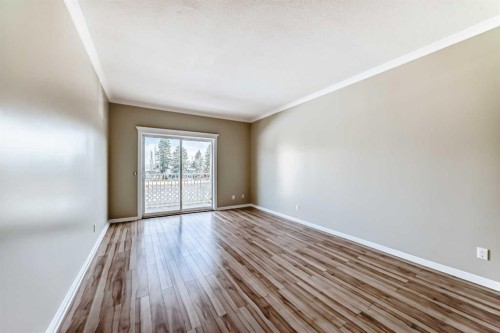 205-7 Lineham Avenue, Okotoks, AB - Indoor Photo Showing Other Room