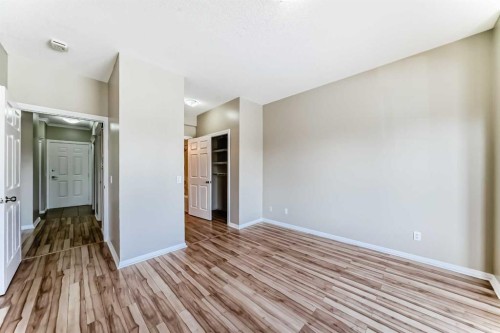 205-7 Lineham Avenue, Okotoks, AB - Indoor Photo Showing Other Room