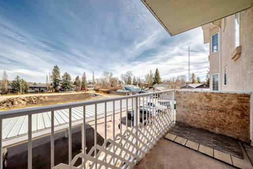 205-7 Lineham Avenue, Okotoks, AB - Outdoor With Balcony With Exterior