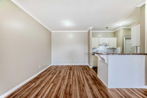 205-7 Lineham Avenue, Okotoks, AB - Indoor Photo Showing Kitchen
