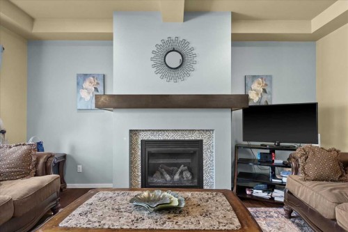 15 Sage Berry Road Nw, Calgary, AB - Indoor Photo Showing Living Room With Fireplace
