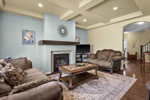 15 Sage Berry Road Nw, Calgary, AB - Indoor Photo Showing Living Room With Fireplace