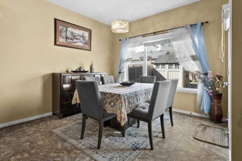 15 Sage Berry Road Nw, Calgary, AB - Indoor Photo Showing Dining Room
