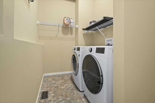 15 Sage Berry Road Nw, Calgary, AB - Indoor Photo Showing Laundry Room