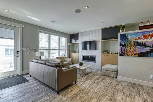 2418 24A Street Sw, Calgary, AB - Indoor Photo Showing Other Room With Fireplace